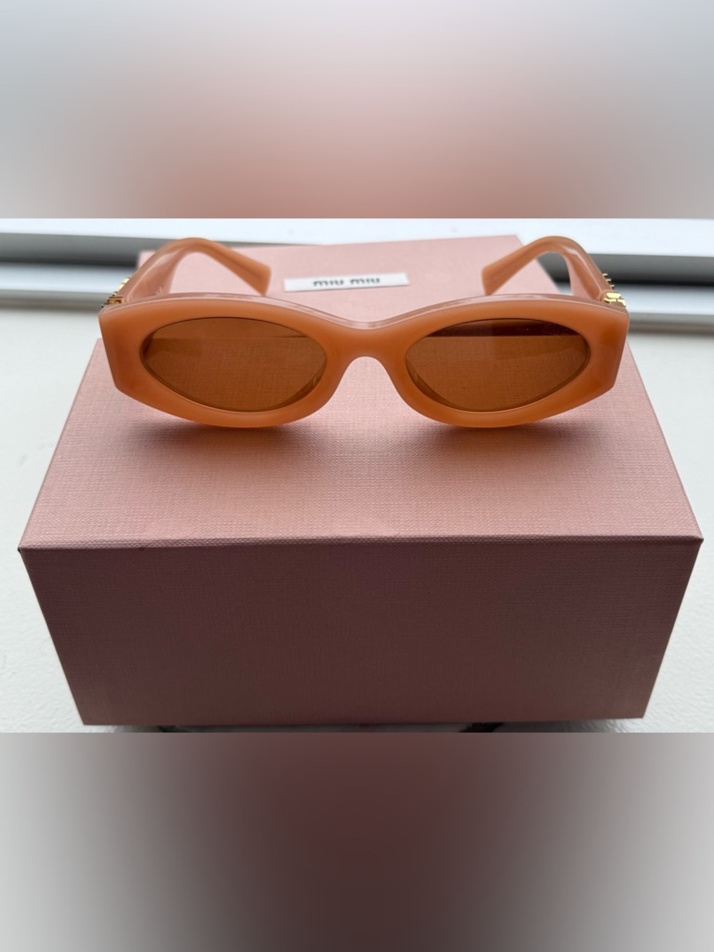 Beautiful Miu Miu pink acetate oval sunglasses